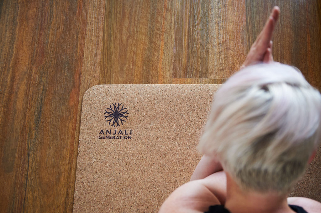Person on Cork Yoga Mat