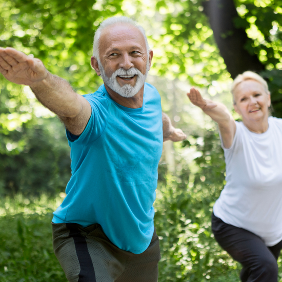 older adults doing yoga 
